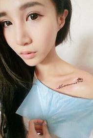 pretty girl clavicle English letter tattoo