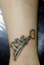 girl's leg Peugeot key tattoo pattern