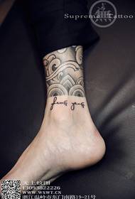 ankle text tattoo