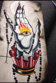 Rokopis z vzorcem tatoo za oko v rokah evropske šole