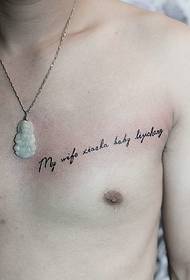 at Small fresh English tattoo on the collarbone