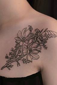 left side of the clavicle side look beautiful flower tattoo pattern