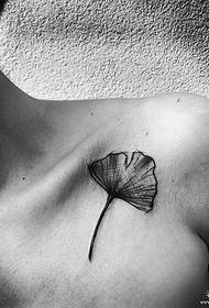female clavicle ginkgo leaf pen-style tattoo pattern