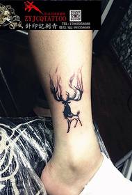 bare nude cute deer tattoo