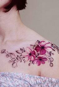 Sweet and fresh flower tattoo pattern at the shoulder and the clavicle