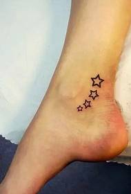 fashionable beautiful ankle at the little star tattoo