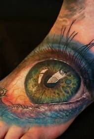 instep green big eyes tattoo pattern