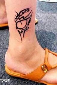 modeli i tatuazhit të syrit të këmbëve totem