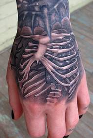 hand back personality bone heart tattoo