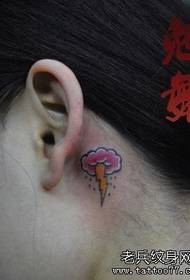 girl ear one Black clouds and small lightning tattoo patterns