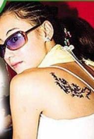 Cecilia Cheung's tattoo star after Black dragon tattoo picture on the back