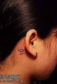 behind the ear totem note tattoo pattern