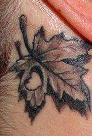 early personality maple leaf tattoo