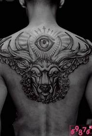 domineering horns head eyes black and white tattoo