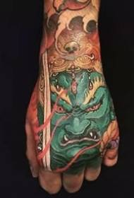 hand back tattoo - sekelompok karya tato pola tangan penuh warna yang mendominasi