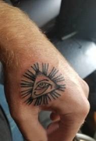 ruka späť tetovanie na zadnej strane chlapca na čiernom obrázku Božej tetovanie očí