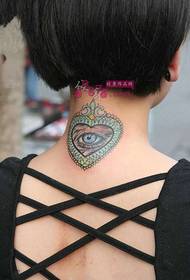 creative blue heart God eye tattoo picture