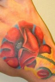 虞美人 Tatuiruočių nuotraukos Mergaitė nutapė ant mergaitės rankos tatuiruotės paveikslo užpakalinės dalies