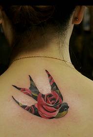 carrying a small swallow tattoo on the back of the tattoo