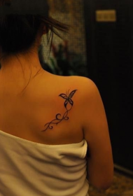 girls back butterfly vine tattoo pattern