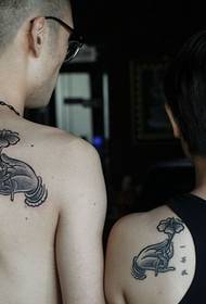 bergamot lotus couple back tattoo