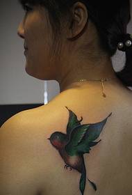 a lively little swallow tattoo is very cute