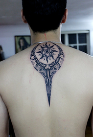 men's good-looking totem tattoo