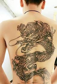 80 men's back has a powerful dragon tattoo pattern