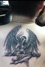 Vīrietis atpakaļ sexy eņģelis tetovējums