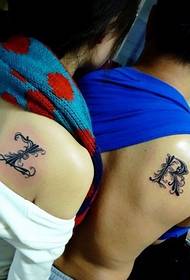 couple English letters love tattoo