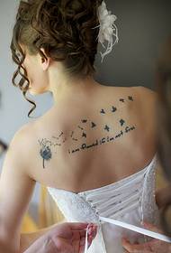 beautiful bride back dandelion tattoo