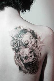 beauty and skull avatar back tattoo