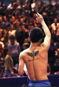 Zhang Jike back wings cross tattoo