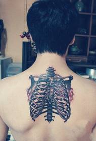 ʻ sklelo Skullon Skeleton Back Tattoo