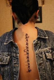 Western-style crush on the back of the Sanskrit tattoo