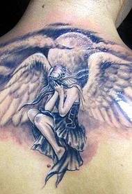 female crying black ash on the back Angel tattoo
