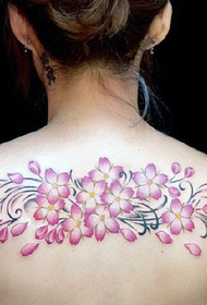 female back painted cherry blossom tattoo pattern