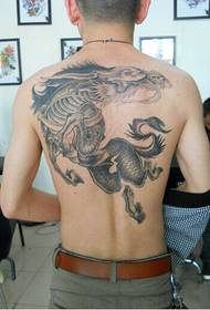 handsome back domineering spirit black and white unicorn animal tattoo