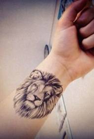 lion head tattoo European and American boys wrist black gray lion head tattoo picture