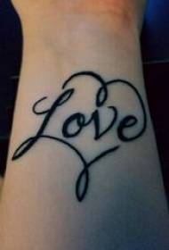 heart-shaped with English tattoo girl wrist on black Heart-shaped with English tattoo pictures