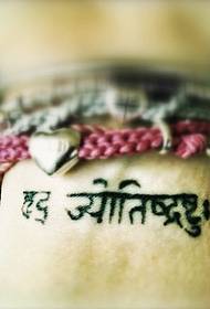 girl's wrist good-looking Sanskrit tattoo