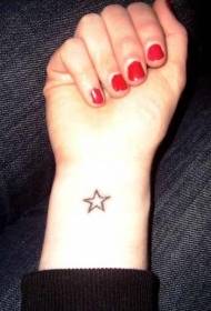 simple five-pointed star tattoo on the wrist