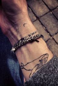 black line whale wrist tattoo pattern