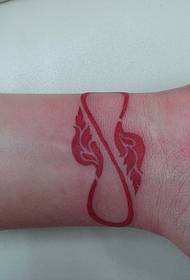 red totem tattoo on the wrist