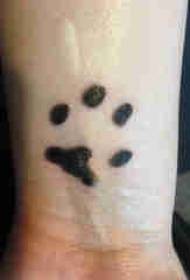 dog claw tattoo on the wrist of the dog paw tattoo picture