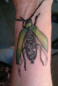 wrist green mechanical beetle tattoo pattern