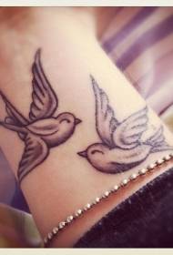 Wrist two black-gray bird tattoo designs