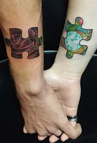 a good-looking jigsaw tattoo on a couple's wrist