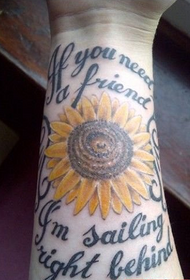 bunga matahari di lengan tatu abjad Inggeris