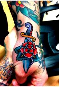 hand old school dagger with red rose tattoo pattern